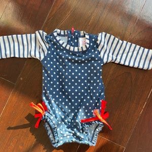 Ruffle Butts baby girl rash guard